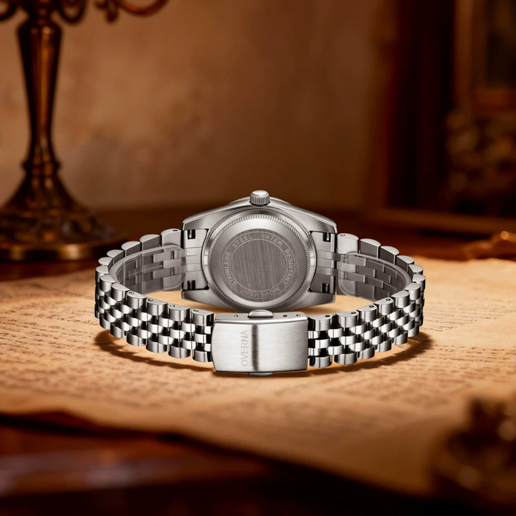 Royal Ladies Watch showcased with a stylish silver band and intricate back design, perfect for elegant occasions.